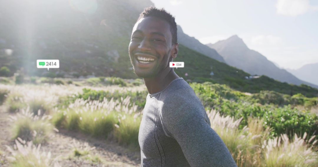 Smiling Man Enjoying Nature with Social Media Interaction Icons