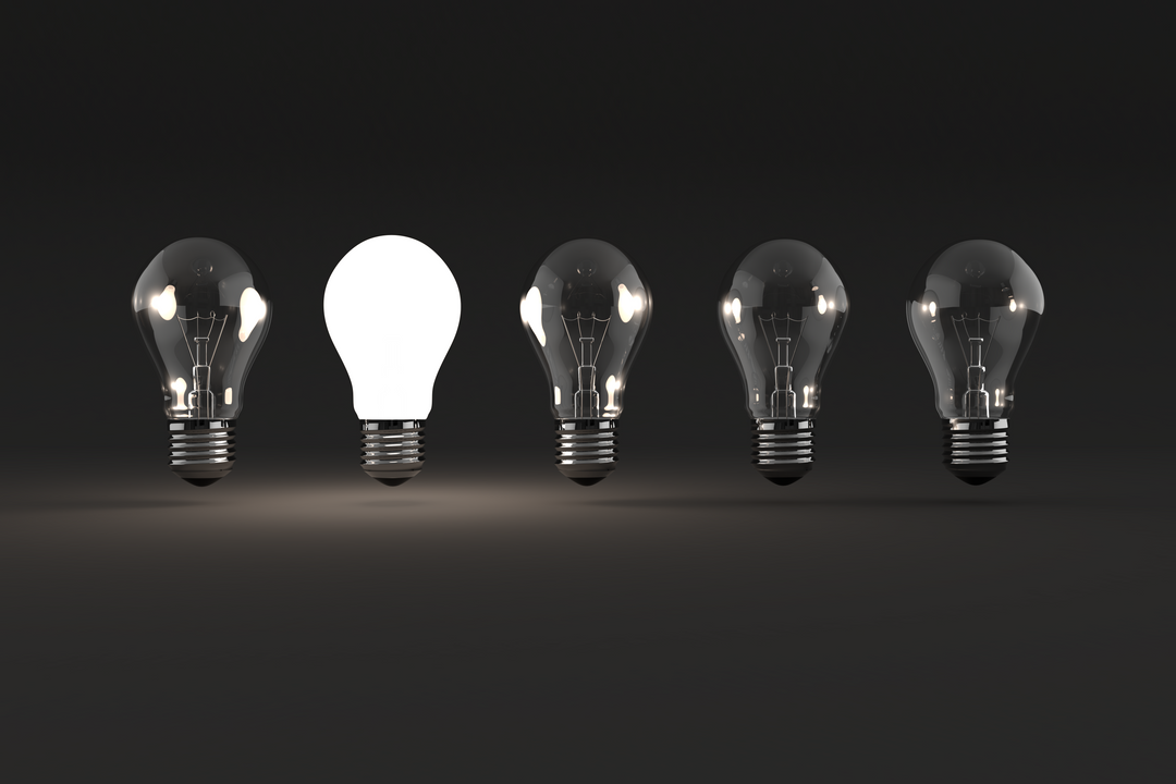 Transparent light bulbs with single illuminated bulb on dark background - Download Free Stock Images Pikwizard.com