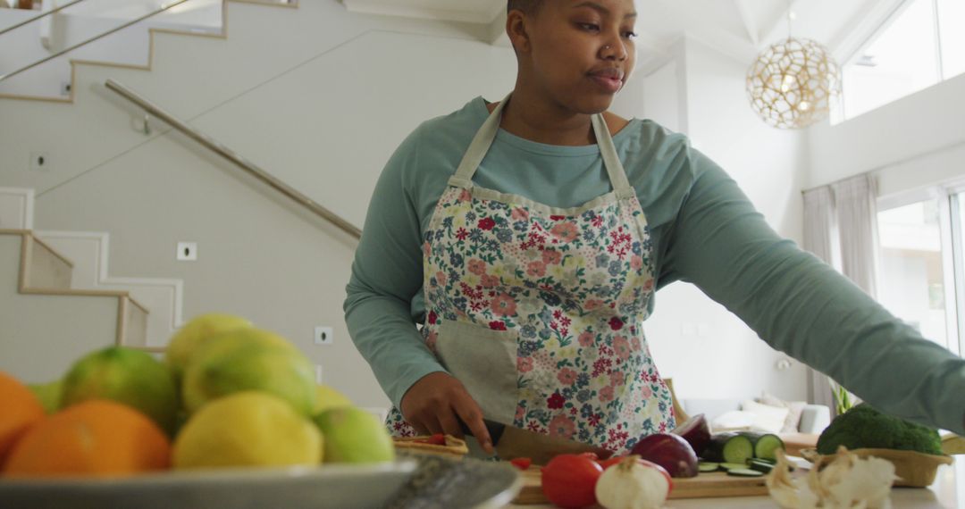 Woman Prepares Fresh Vegetables in Modern Kitchen - Free Images, Stock Photos and Pictures on Pikwizard.com