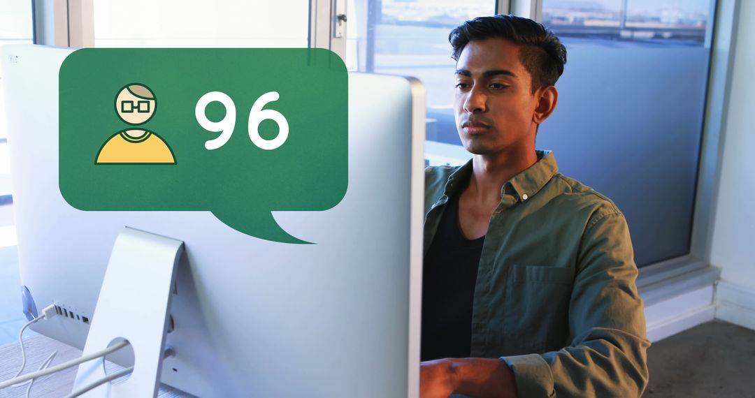 Focused Man Checking Digital Engagements on Monitor