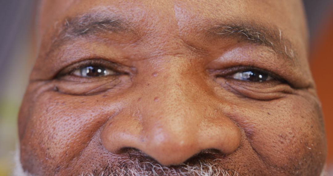 Close-Up of Elderly Man's Eyes and Nose - Free Images, Stock Photos and Pictures on Pikwizard.com