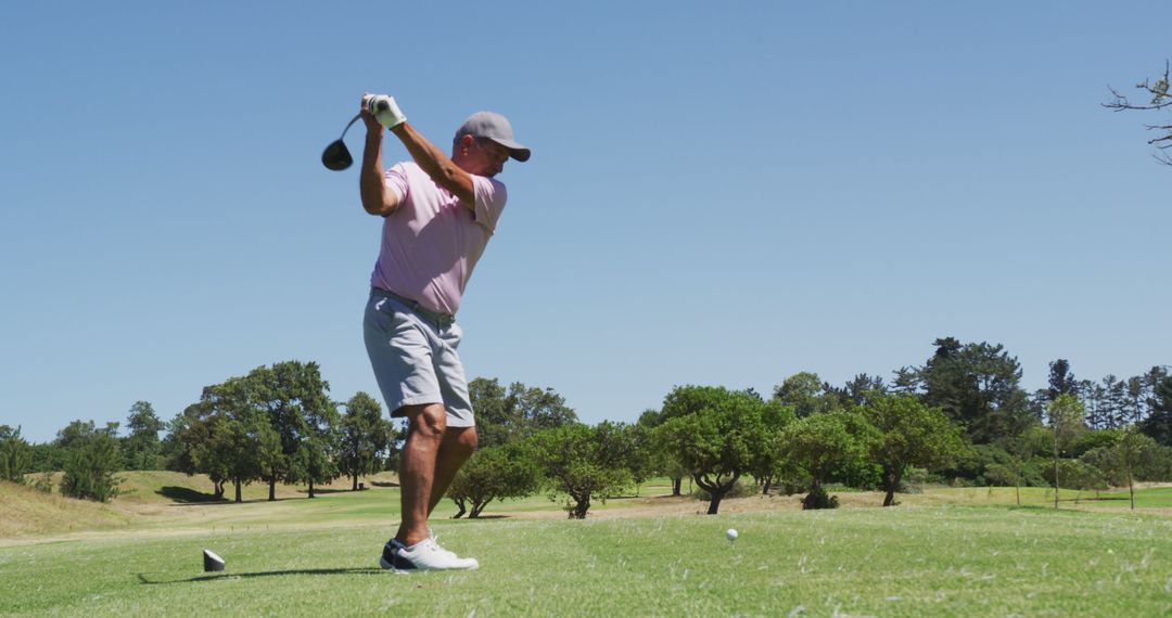 Senior Golfer Swinging on Sunny Day for Active Lifestyle