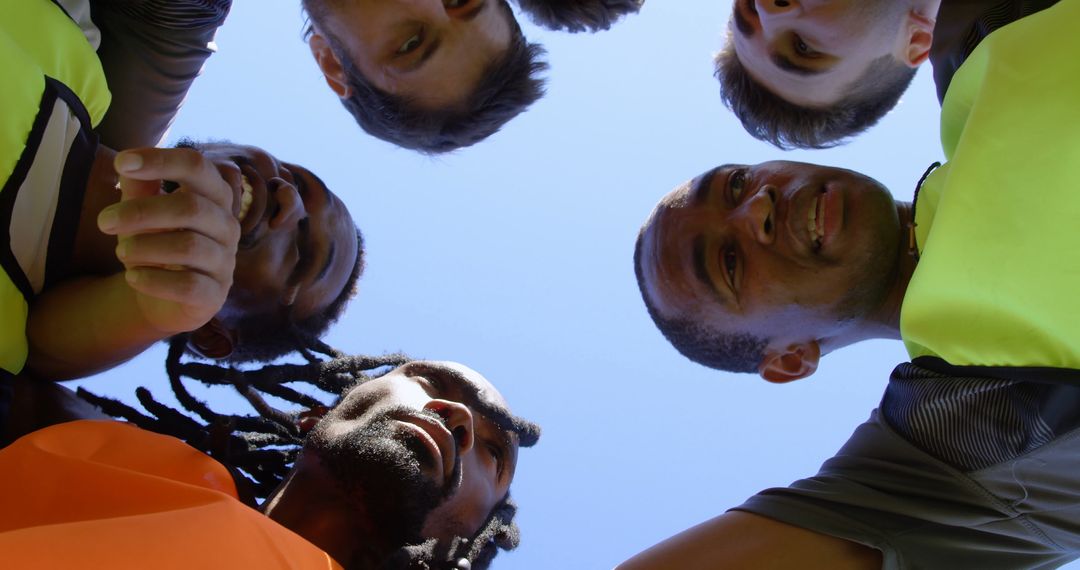 Diverse Sports Team Huddling Outdoors in Unity