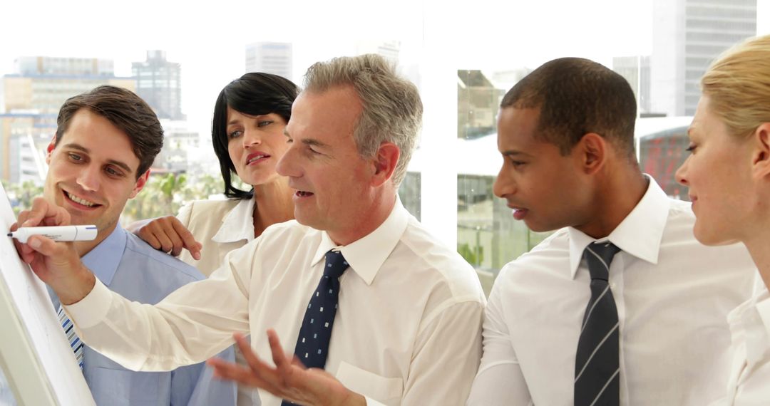 Diverse Team Collaborating in Office Conference Room Presentation