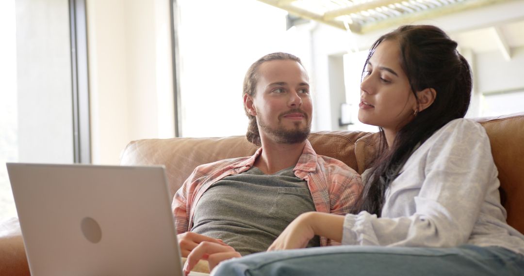 Relaxed Couple Enjoying Technology Together at Home