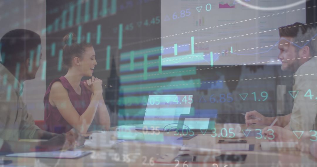 Diverse Business Team Engaged in Financial Data Analysis Meeting