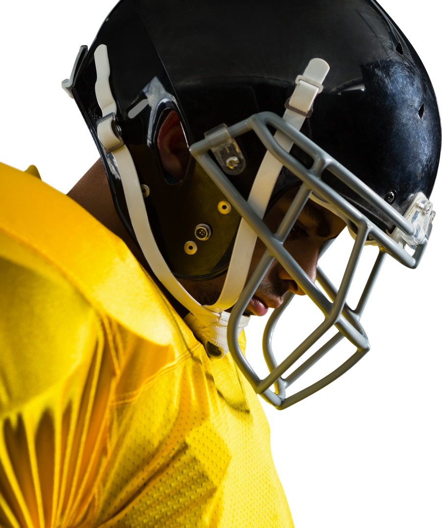 Side View of Serious American Football Player Wearing Helmet Looking Down - Download Free Stock Images Pikwizard.com