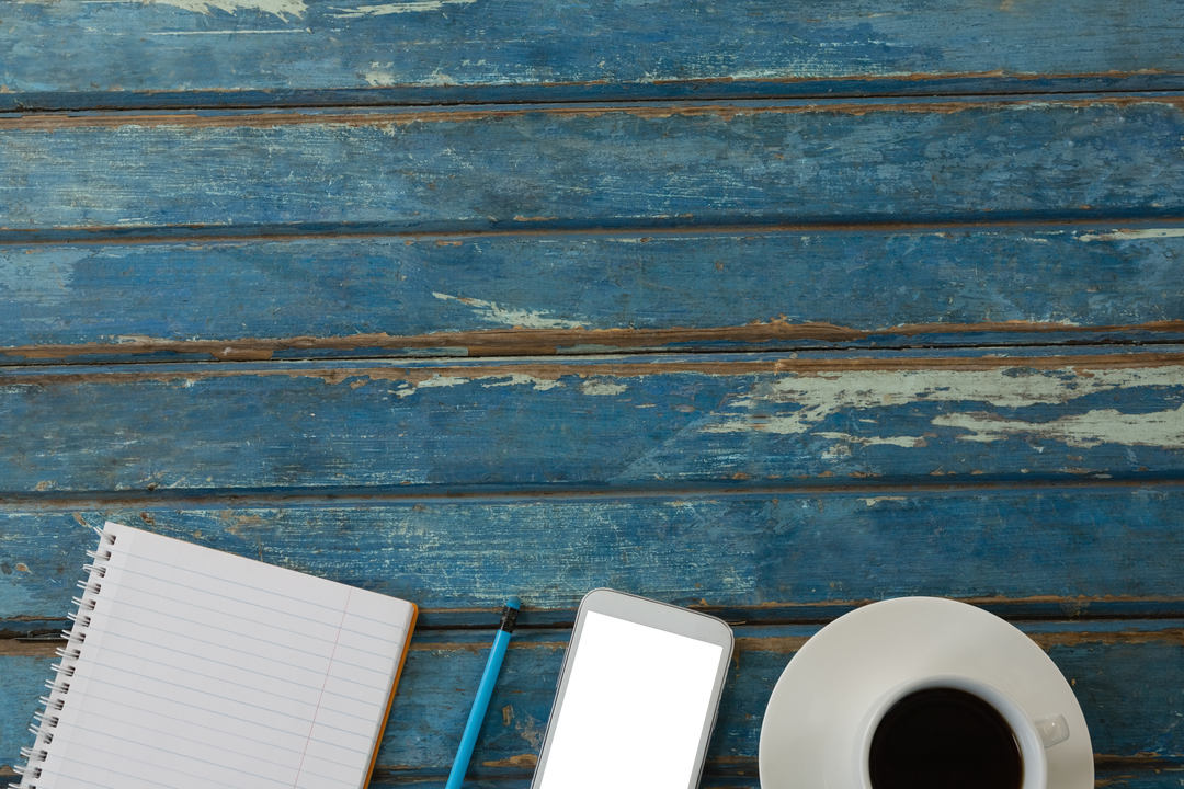 Transparent Smartphone Notebook Coffee Cup on Rustic Blue Wooden Background - Download Free Stock Images Pikwizard.com