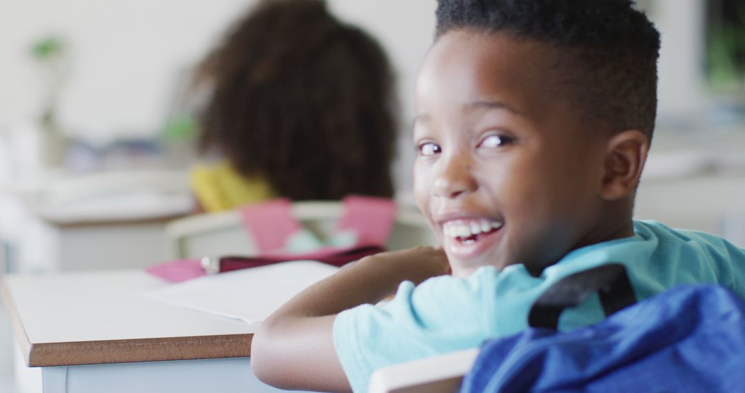 Smiling Boy Engaging in Classroom Learning