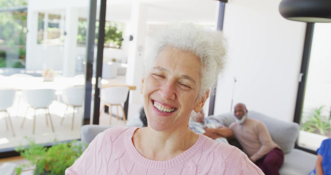 Portrait of happy senior caucasian woman with other seniors at retirement home - Free Images, Stock Photos and Pictures on Pikwizard.com