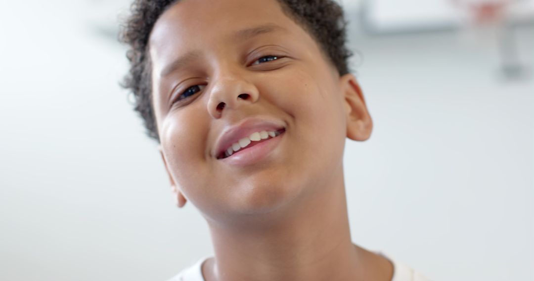 Happy African American Boy Smiling Playfully in Playroom