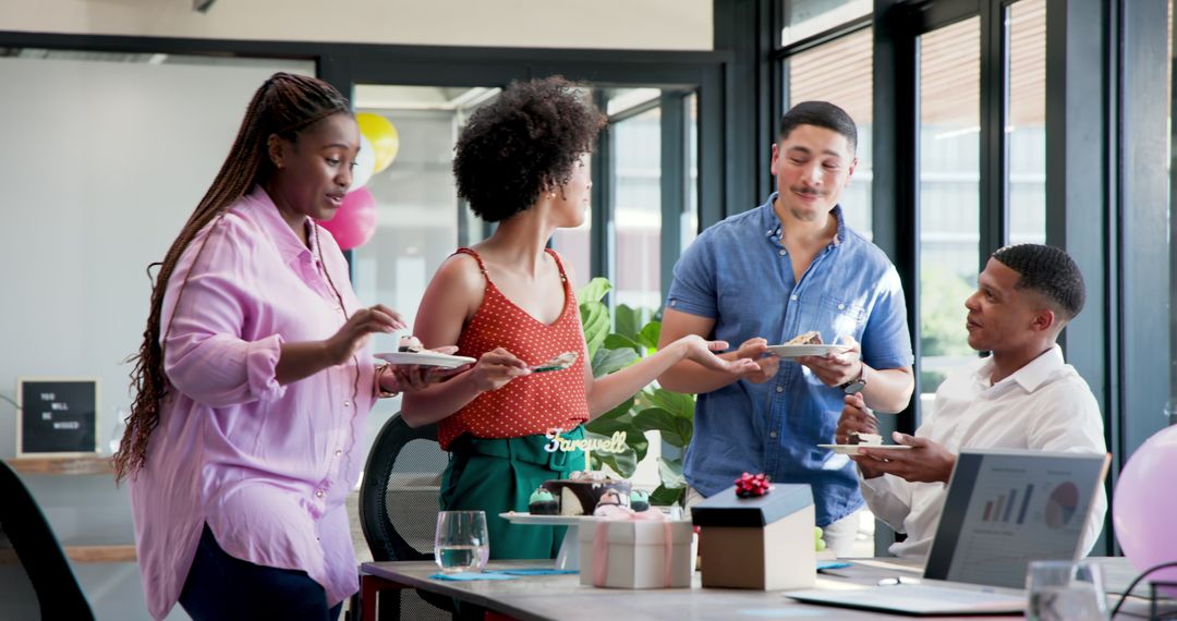 Joyful Farewell Party with Multiracial Colleagues Sharing Cake