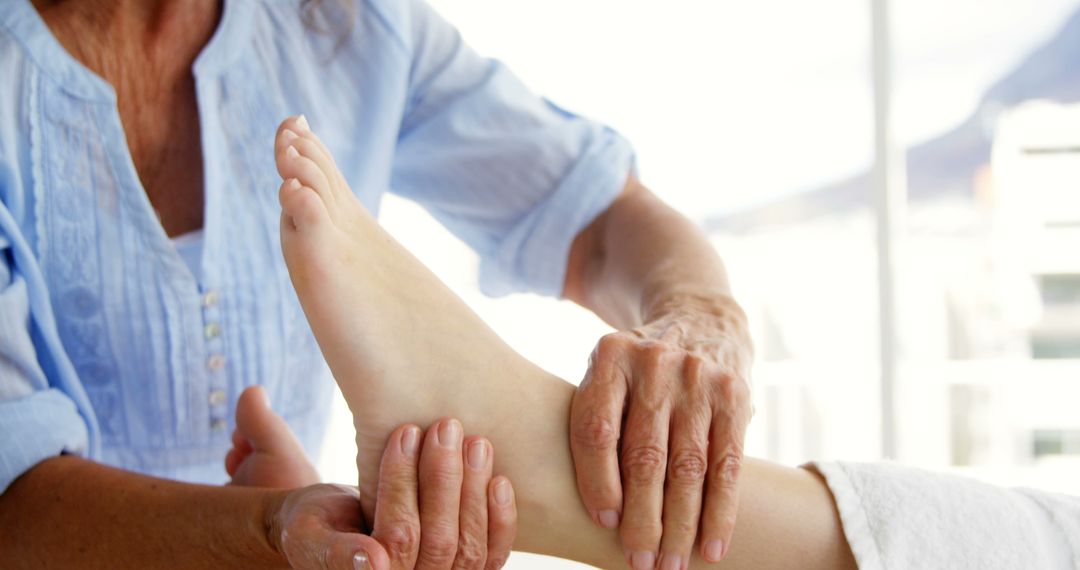 Professional Reflexology Therapy Session on Female Foot - Free Images, Stock Photos and Pictures on Pikwizard.com