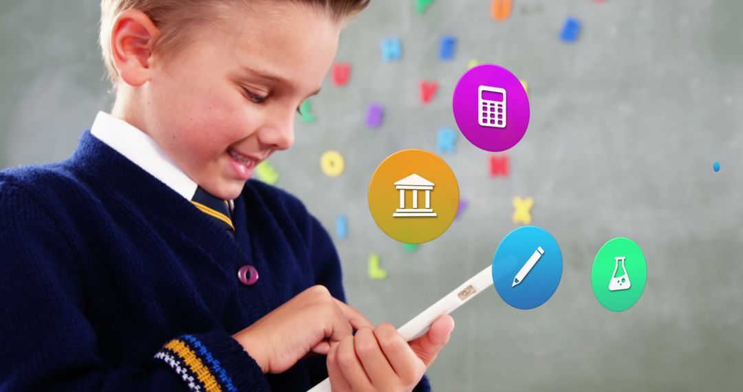 Schoolboy Using Tablet with Educational Icons Floating Around