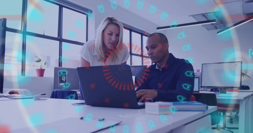 Collaborating team reviewing laptop in bright modern office with animated HUD overlay