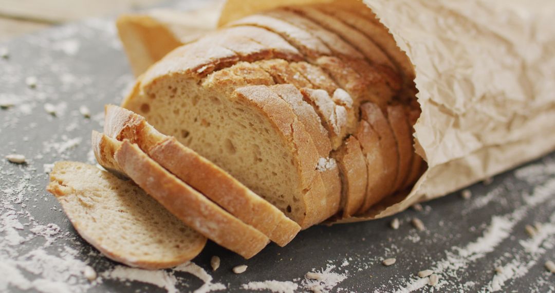 Rustic Sliced Bread in Paper Bag on Rustic Surface