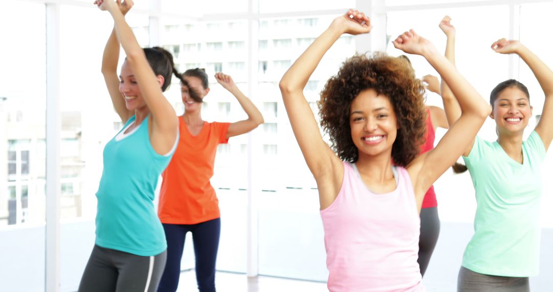 Group of Women Enjoying a Lively Dance Workout - Free Images, Stock Photos and Pictures on Pikwizard.com