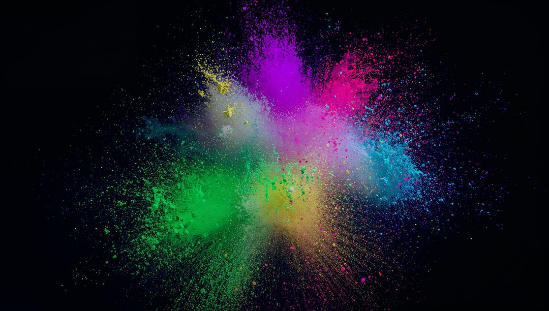 Dynamic Multicolored Powder Explosion Against a Dark Background