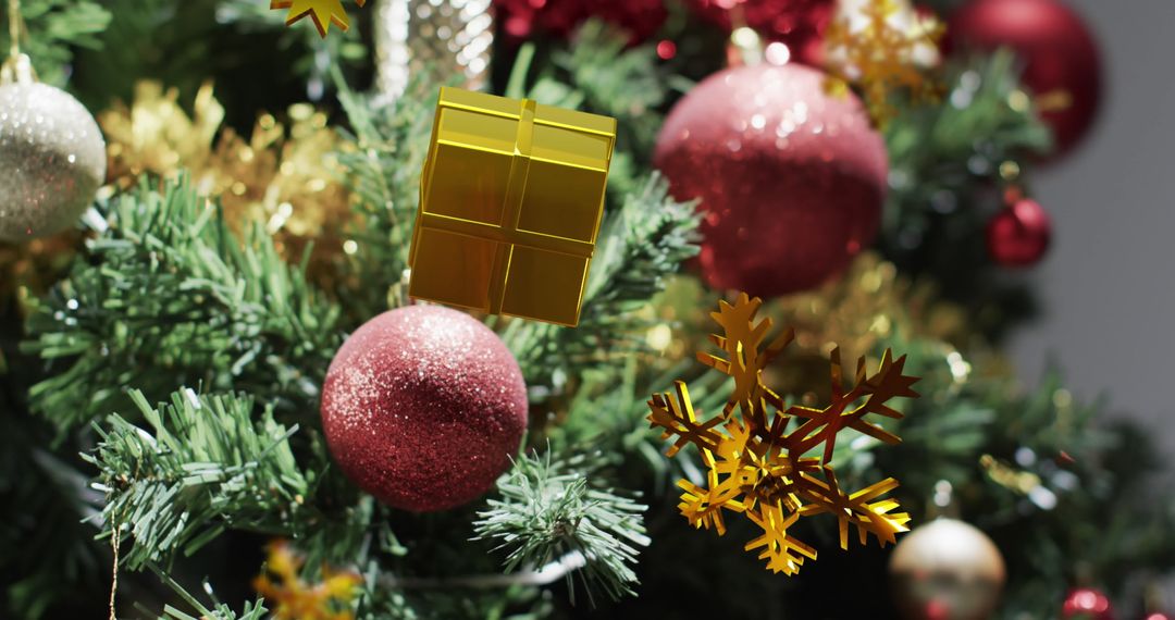 Gold and Red Ornaments Adorning Lush Christmas Tree Branches