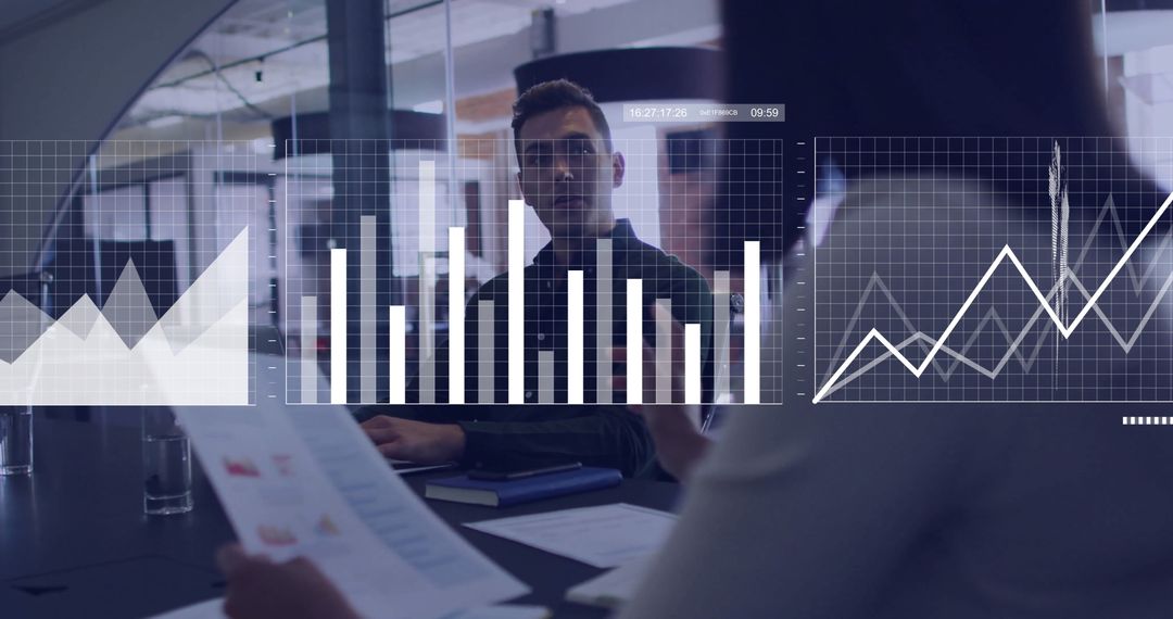 Business Team Analyzing Data with Transparent Graphs