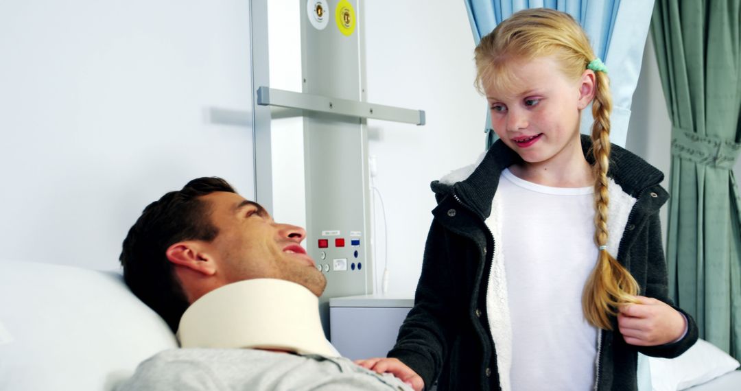 Father with Neck Brace Smiling at Daughter in Hospital Room - Free Images, Stock Photos and Pictures on Pikwizard.com