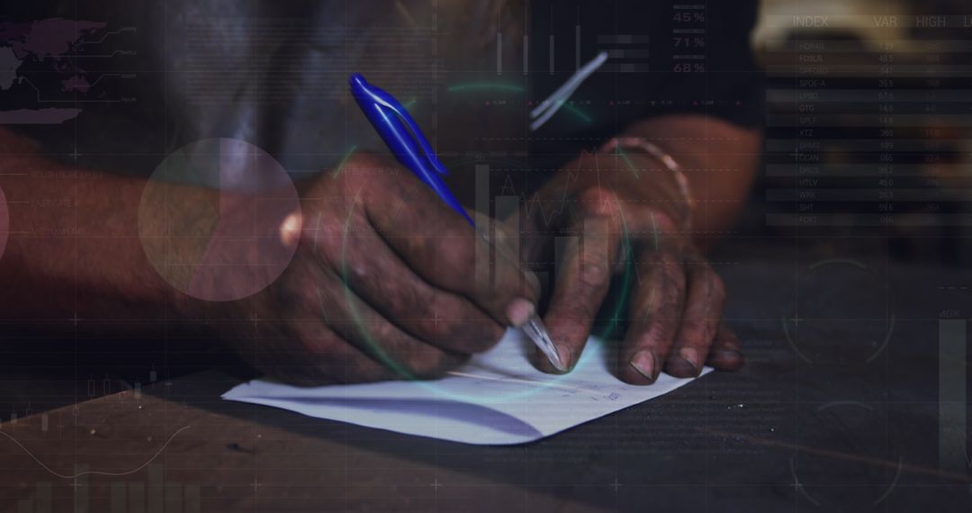 Man Writing Notes with Overlay of Data Graphics