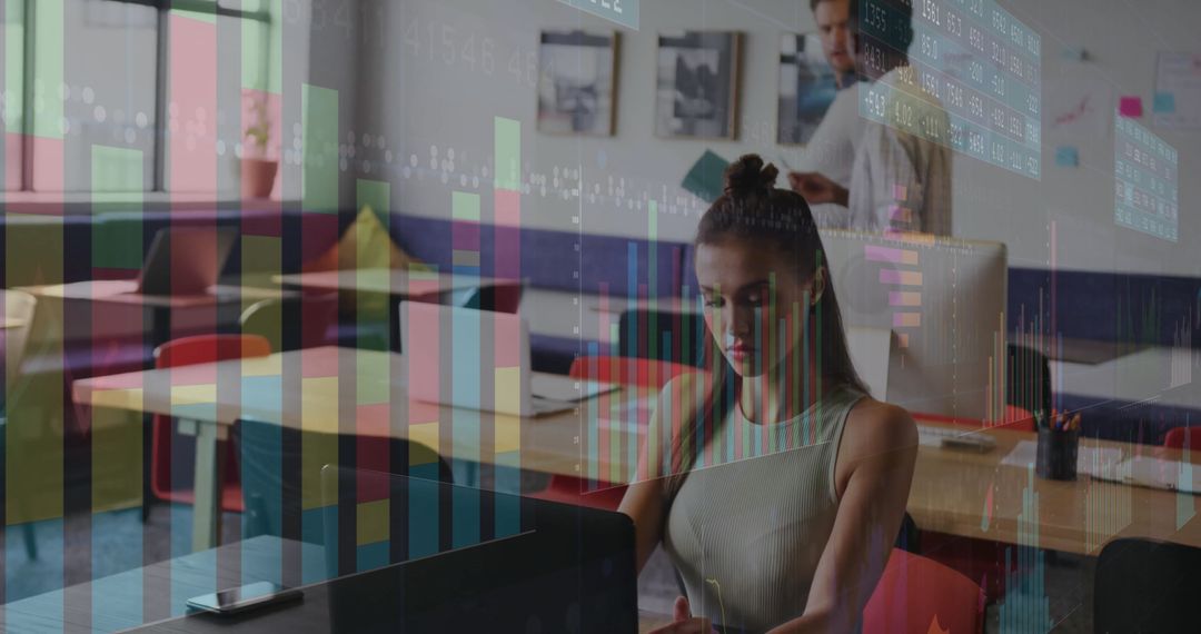 Young Businesswoman Working in Modern Coworking Space with Data Overlay