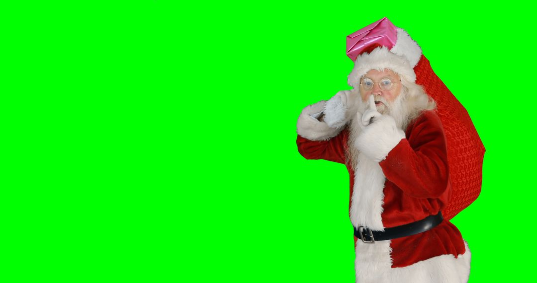 Santa Claus thinking with gift bag on green background - Free Images, Stock Photos and Pictures on Pikwizard.com