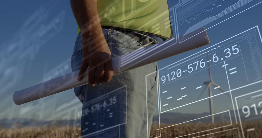 Engineer Analyzing Digital Schematics at Wind Farm