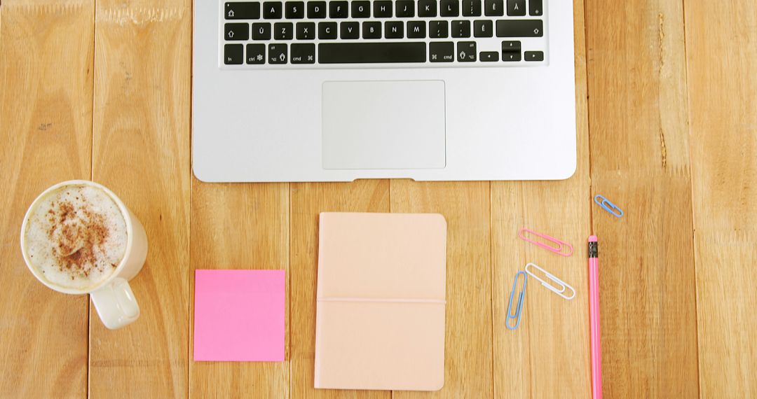 Organized Workspace with Laptop, Notebook, and Coffee on Wooden Desk - Free Images, Stock Photos and Pictures on Pikwizard.com