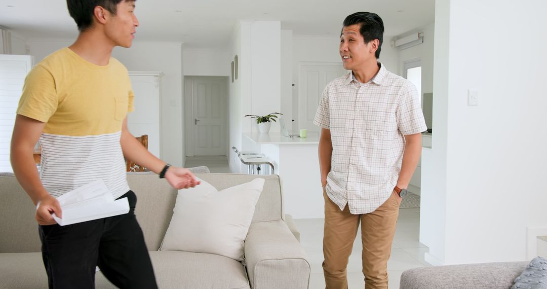 Father Supports Son During Family Conversation at Home