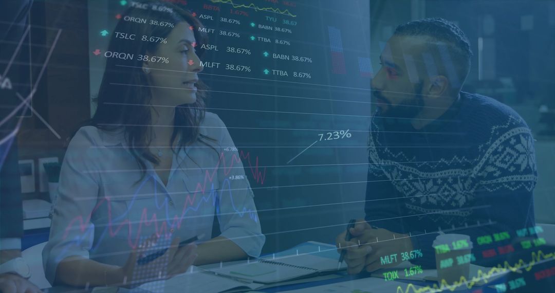 Diverse Professionals Analyzing Digital Stock Data in Modern Office