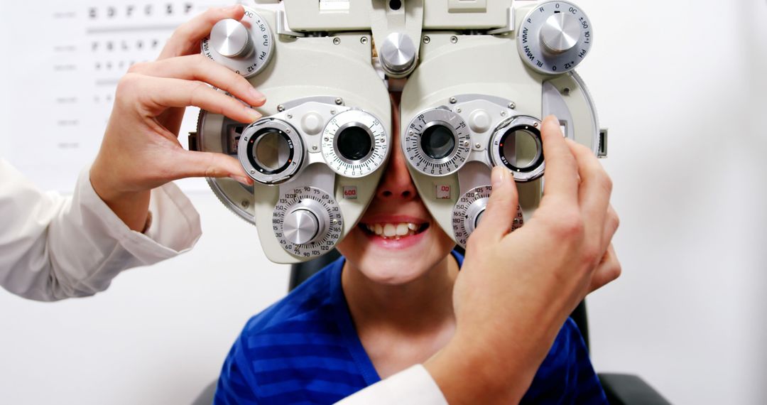 Child Undergoing Eye Examination with Phoropter - Free Images, Stock Photos and Pictures on Pikwizard.com