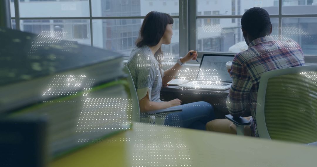 Diverse Business Professionals Analyzing Data with Digital Datastream Overlay