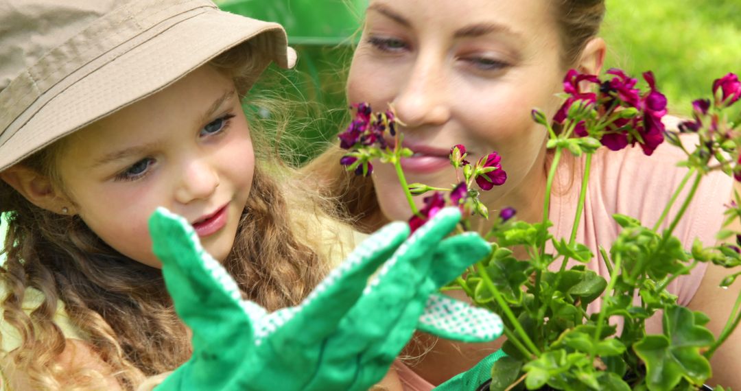 Mother and Daughter Enjoying Gardening Together Outdoors - Free Images, Stock Photos and Pictures on Pikwizard.com