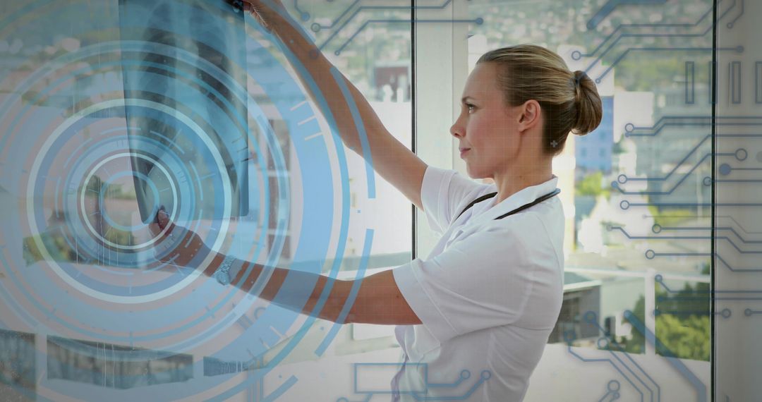 Female Doctor Analyzing X-ray Films with Digital Interface Enhancement