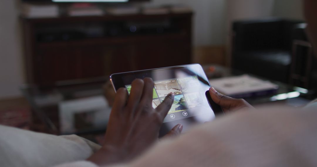 Close-Up of Person Using Tablet at Home - Free Images, Stock Photos and Pictures on Pikwizard.com