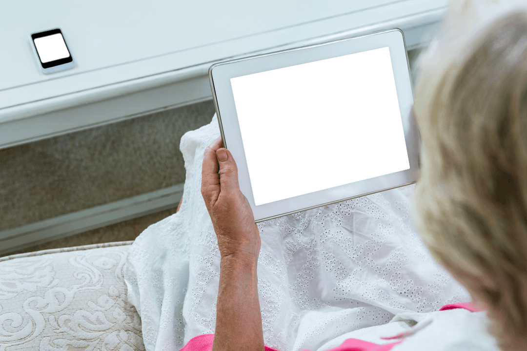Senior Woman Relaxing with Digital Tablet and Transparent Screen