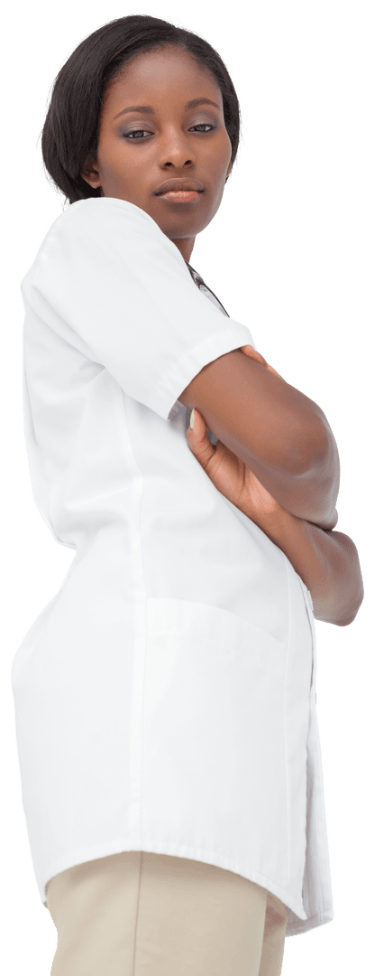 Confident Young Nurse in White with Arms Crossed Commanding Respect