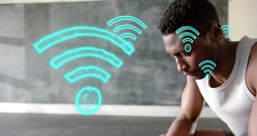 Leaning Man Pausing After Workout in Minimal Studio with Floating Wi-Fi Signals and Focused Gaze