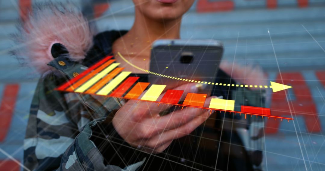 Declining Arrow and Graph Over Woman Using Smartphone