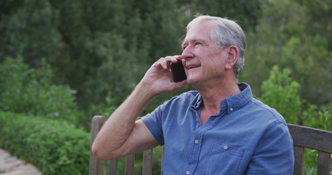 Senior Man Enjoying Nature While Chatting on Cellphone - Free Images, Stock Photos and Pictures on Pikwizard.com