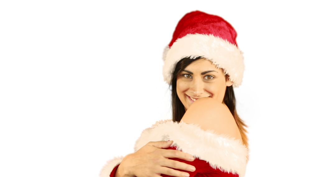 Woman Wearing Santa Hat Smiling on White Background - Free Images, Stock Photos and Pictures on Pikwizard.com