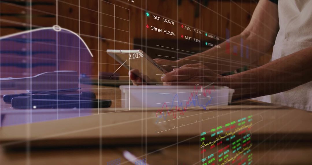 Analyzing Financial Charts Using Tablet in Home Office
