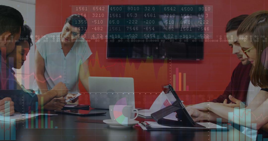 Diverse Team Analyzing Financial Data in Collaborative Business Meeting