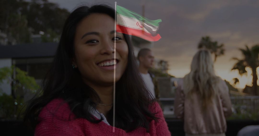 Smiling Woman on Rooftop with Sunset Background