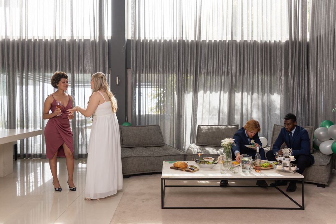 Guests Socializing in Elegant Lounge with Appetizers and Wine