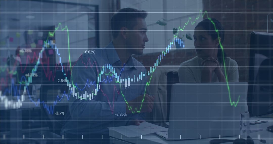 Financial Analysts Discussing Data Charts in Corporate Office
