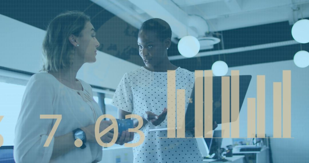 Statistical Data Processing with Diverse Businesswomen in Modern Office