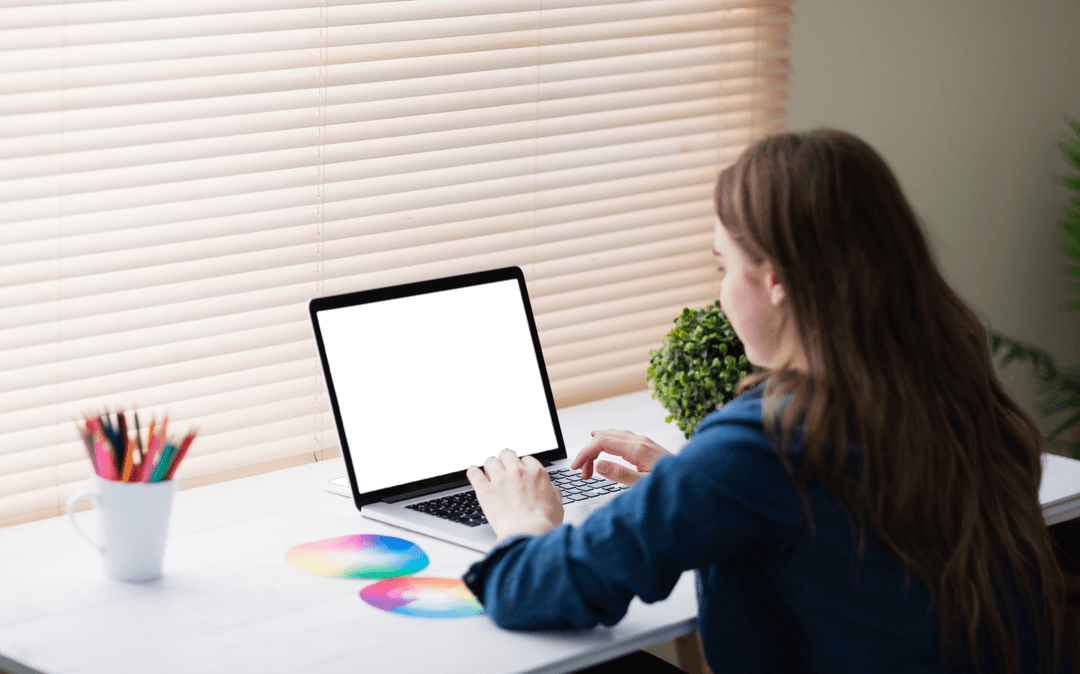Transparent Monitor Showing Woman Working at Desk in Modern Office